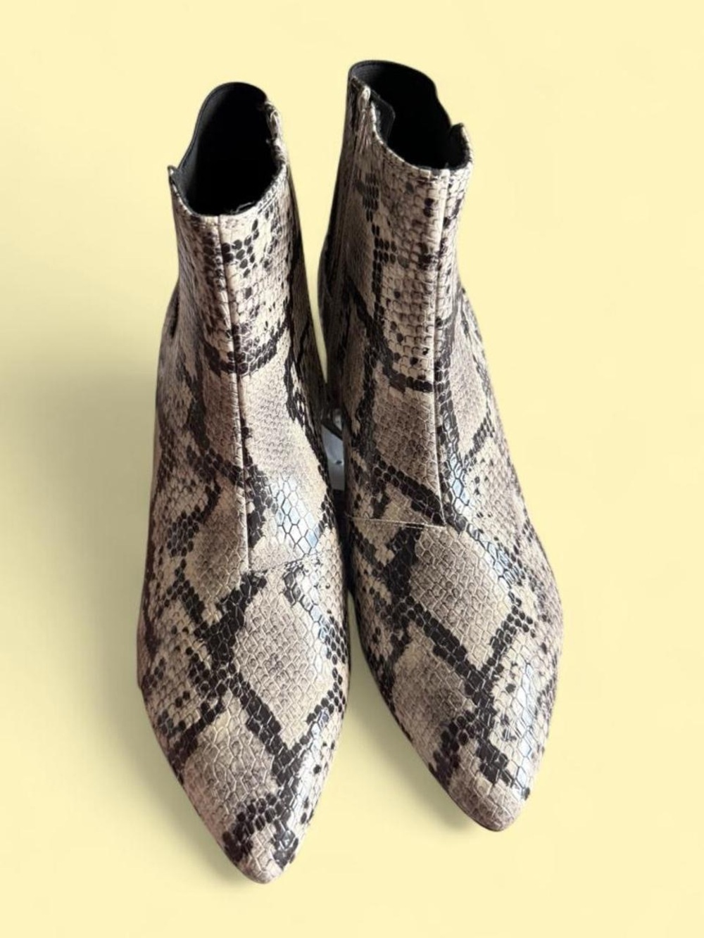 Clarks Snake-Print Chelsea
Ankle Boots in Black and Cream